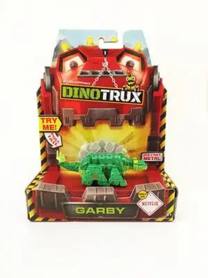A DinoTrux dinosaur truck toy car with removable dinosaur figures displayed in its packaging.