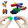 A collection of colorful plastic link cubes in various colors and sizes, shown next to human hands.