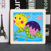 A wooden tangram puzzle featuring colorful animal and traffic designs on a light wood background.