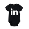 Black letter print cotton baby bodysuit featuring the lowercase 'in' logo.