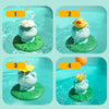 Four steps showing a floating electric water sprinkler frog bath toy being used in water.