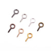 A collection of mini eye pins with screw threads for jewelry making displayed on a white background.