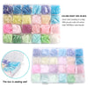 A clear box filled with 20,000 glass seed beads in 24 colors organized into individual bags for jewelry making.