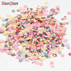 Assortment of colorful soft polymer clay slices for nail art and DIY crafts