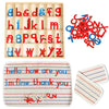 Montessori wooden alphabet box with red and blue letter cards and a fabric greeting card