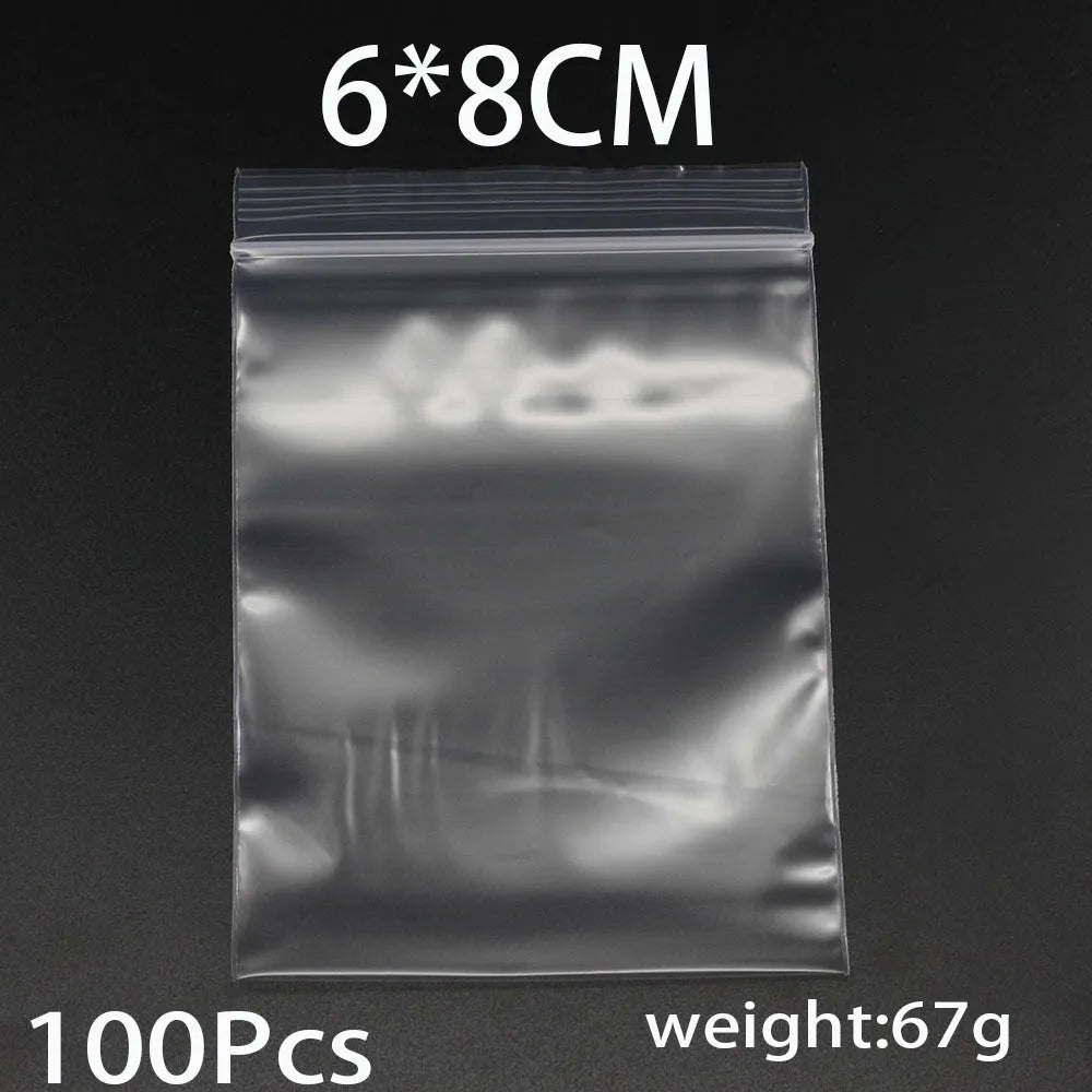 A clear resealable plastic bag containing 100 pieces of small items, measuring 6x8cm and weighing 67g.