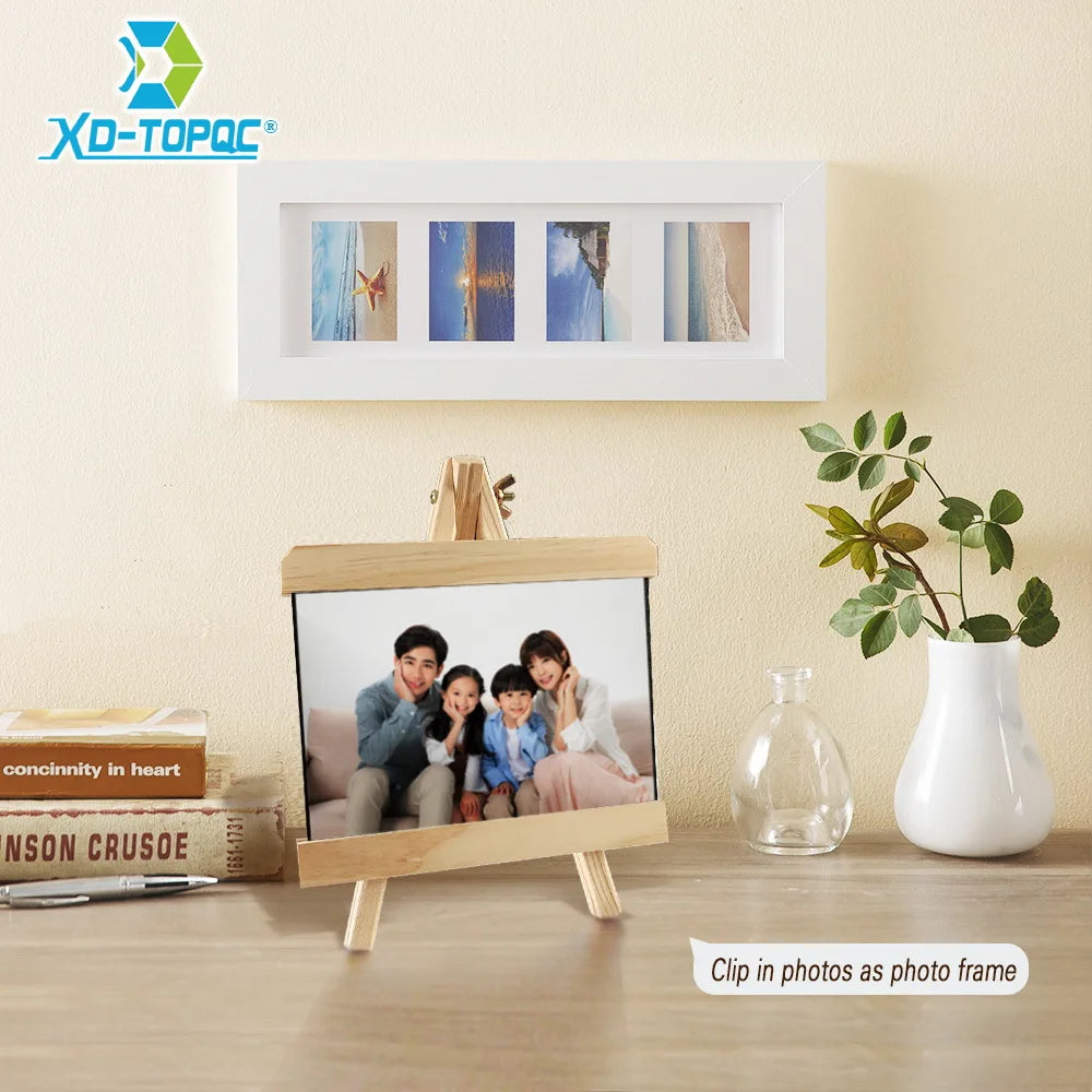 A mini wooden chalkboard easel displaying a family photo on a light wood surface.