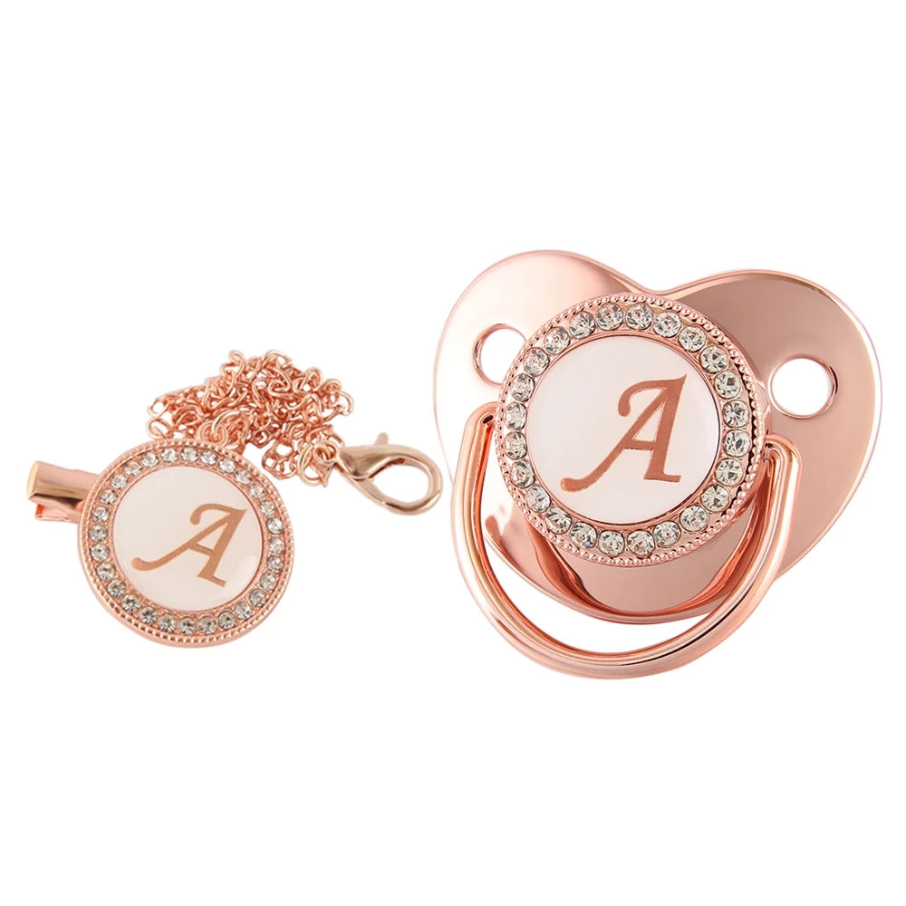 Rose gold bling baby pacifier clip with silicone holder featuring a letter A design
