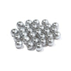 A pile of small, silver-colored imitation pearl beads for DIY jewelry making.