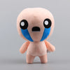 A pink collectible plush toy with large black eyes and blue accents.