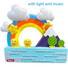 A colorful bath toy set featuring a rainbow arch, clouds, and yellow ducks with light and music.