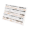 A display of assorted acrylic stud earrings featuring hearts, stars, moons, and various other designs.