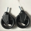 A pair of black stroller accessories including a mosquito net and rain cover.