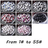 A collection of 55 numbered ceramic beads, ranging from 1# to 55#, displayed in glass bowls.