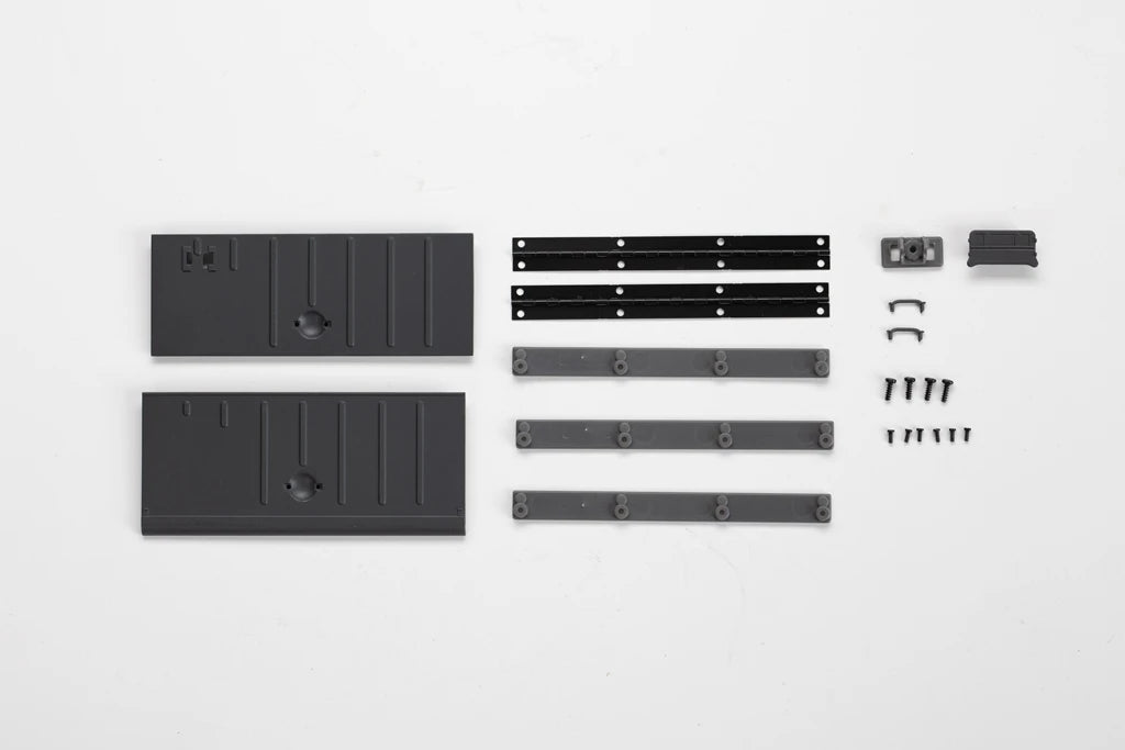 A set of 1:12 scale RC car steering wheel and interior upgrade parts including panels, brackets, and fasteners.