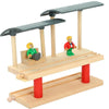 Wooden train track accessories set featuring airport and gas station scenes with figures and track components