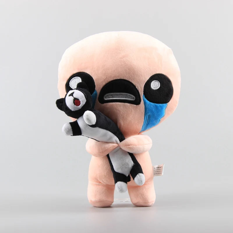A plush toy resembling a stylized, round face with black and white markings and blue accents.
