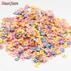 Assortment of colorful soft polymer clay slices for nail art and DIY crafts