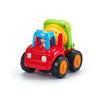 A red and green mini construction vehicle toy set with a driver figure.