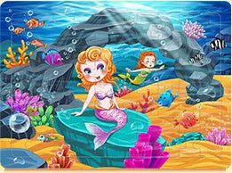 A colorful jigsaw puzzle featuring an underwater scene with fish, coral, and a large rock arch.