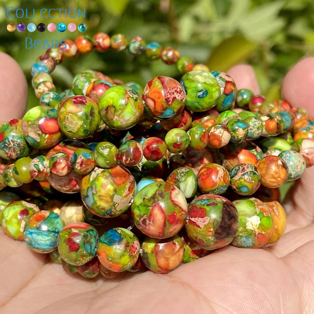 A handful of natural sea sediment jasper and turquoise beads for jewelry making