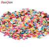 Assortment of colorful soft polymer clay slices for nail art and DIY crafts