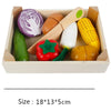 Wooden magnetic fruit and vegetable cutting play set featuring various colored fruits and vegetables like corn, tomatoes, and
