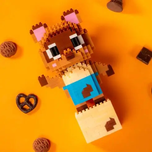 A set of Creative Animal Friends building blocks featuring a brown and pink tiger figure on an orange background.