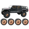 A black 1/10 RC truck with beadlock wheels and a black metal beadlock wheel set.