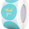 Roll of round teal thank you stickers with gold lettering for gifts and packaging