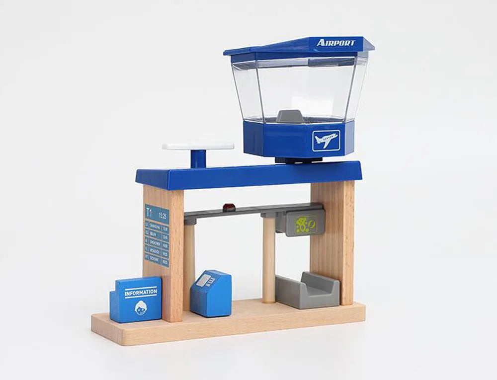 A wooden train track accessory set featuring an airport and gas station scene with blue and gray components.