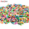Assortment of colorful soft polymer clay slices for nail art and DIY crafts