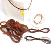Vintage faux leather cords and a yellow charm necklace displayed on a white background.