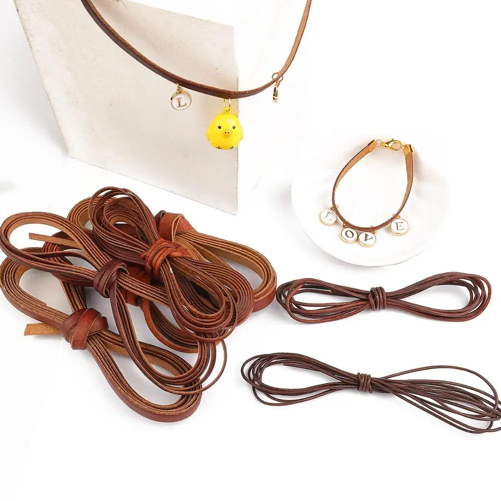 Vintage faux leather cords and a yellow charm necklace displayed on a white background.