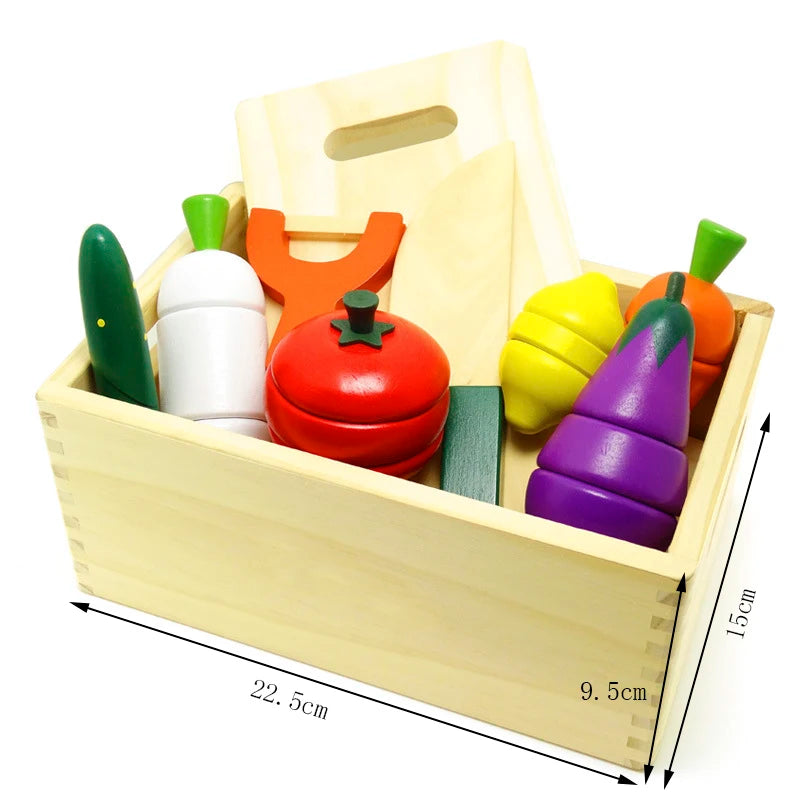 A wooden magnetic fruit and vegetable cutting play set with various colored fruits and vegetables inside a wooden box.