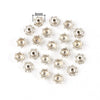 A collection of small, silver-toned Tibetan style hollow flower bead caps for jewelry making.