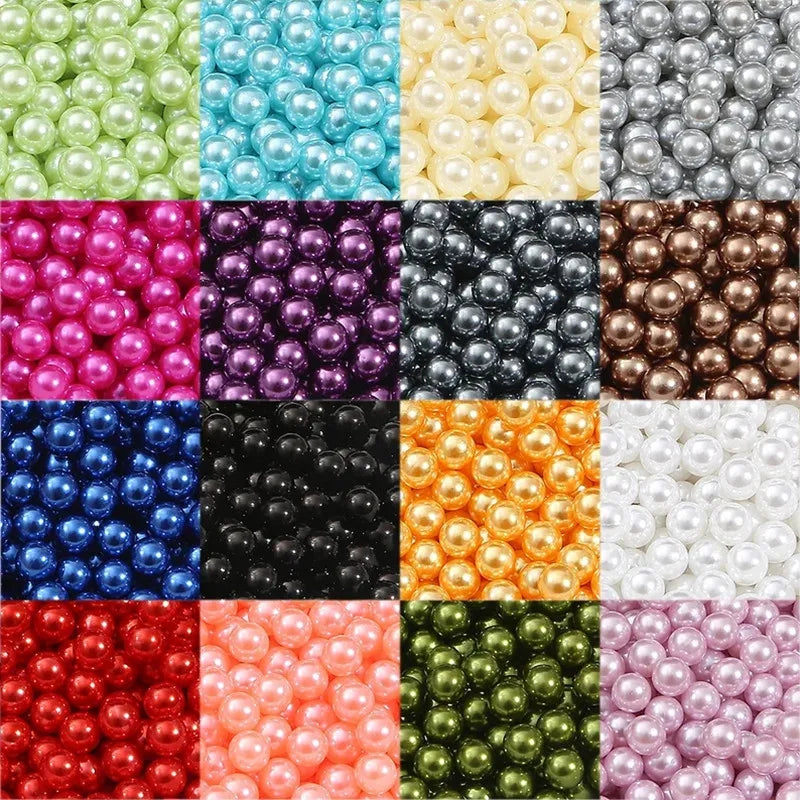 A grid of colorful imitation pearl beads in various shades including green, blue, pink, silver, and gold.