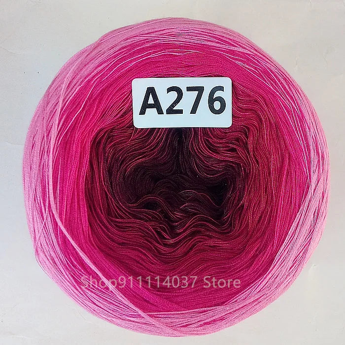Spool of pink and magenta colored mercerized cotton cake yarn labeled A276