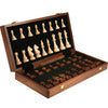 A handcrafted wooden folding chess set with solid walnut pieces displayed in a dark wood box.