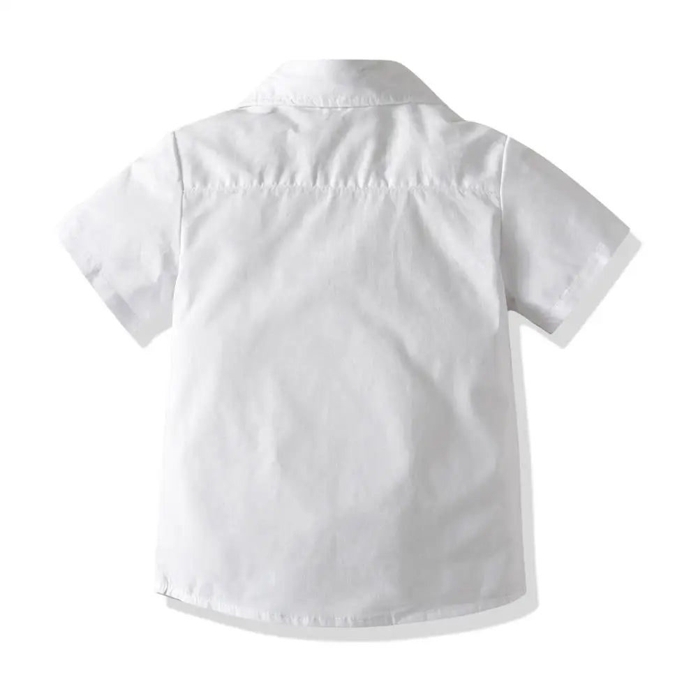 White boys' formal wedding outfit set including a shirt, shorts, and suspenders viewed from the back.