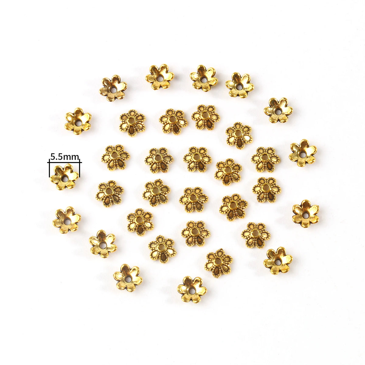 A collection of small, gold-colored Tibetan style hollow flower bead caps for jewelry making.