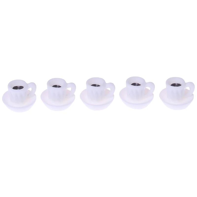 A set of five white mini resin coffee cups for dollhouse kitchens