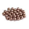 A pile of small, round, bronze-colored imitation pearl beads for DIY jewelry making.