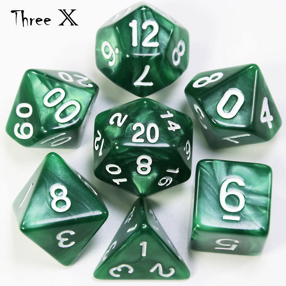 A set of green marble effect polyhedral dice including a dodecahedron, tetrahedron, and other shapes.