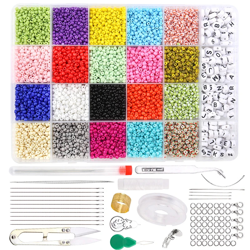 A variety of colorful glass seed beads in various shades are displayed alongside tools for jewelry making.