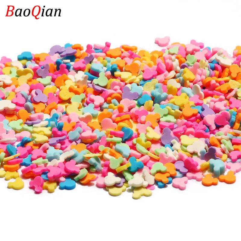 A pile of colorful soft polymer clay slices assorted in various shades of pink, blue, green, and orange for nail art and DIY 