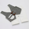 A black and white plaid vest and matching white long-sleeved outfit for a newborn photography set.