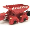 A red die-cast dinosaur truck toy with a removable dino figure.