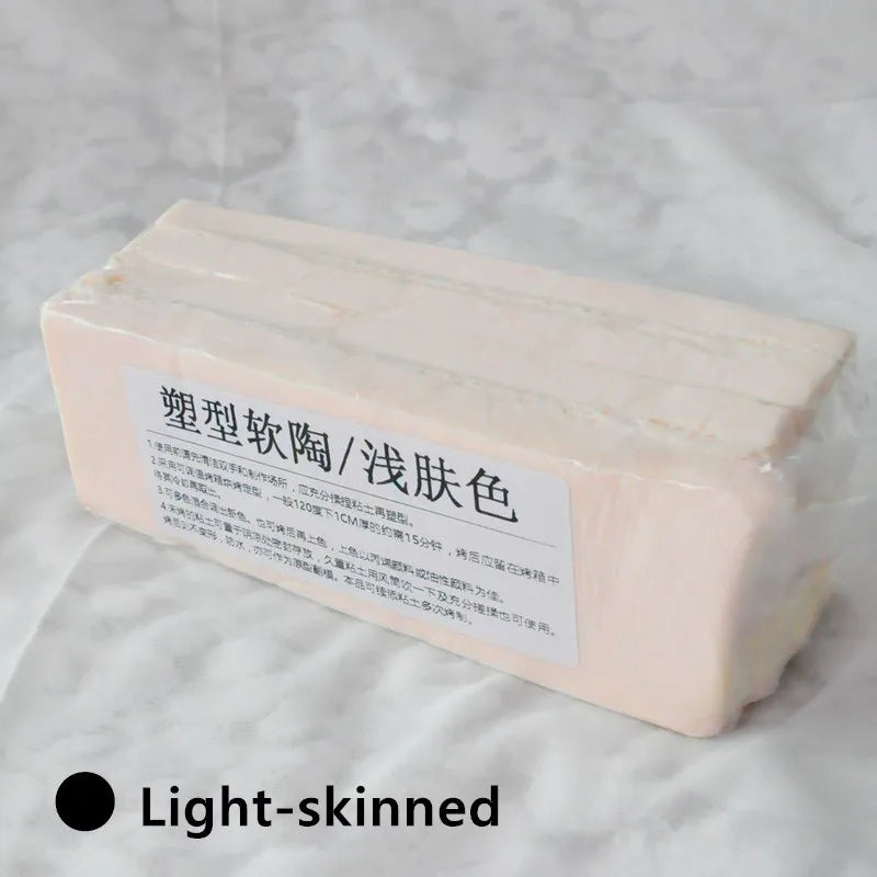 A rectangular block of light pink polymer clay for sculpting and doll making is shown on a white surface.