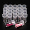 A collection of clear plastic storage bottles for diamond painting beads and crafts, arranged in rows.